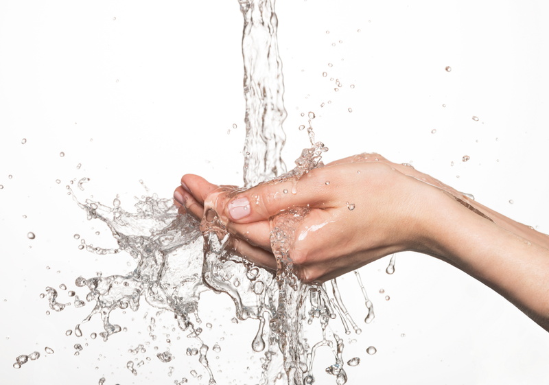 closeup-hands-under-flow-of-water